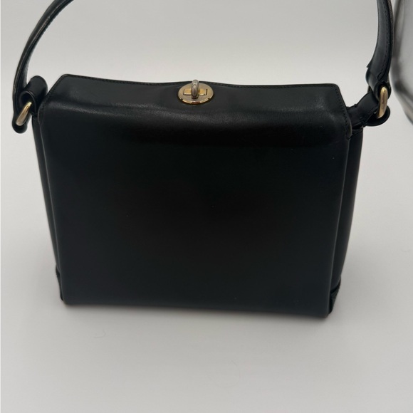 Gucci Handbags - Elegant VINTAGE Gucci Black Leather Handbag. EUC mirror and pouch COA